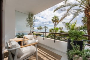 "Luxury renovated beachfront apartment with panoramic sea views."